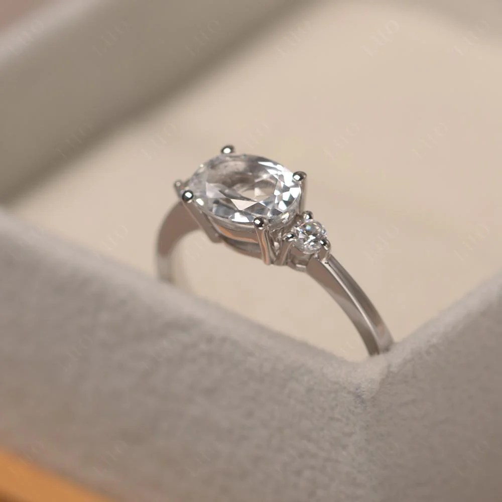 Oval East West White Topaz Trilogy Ring - Image 11