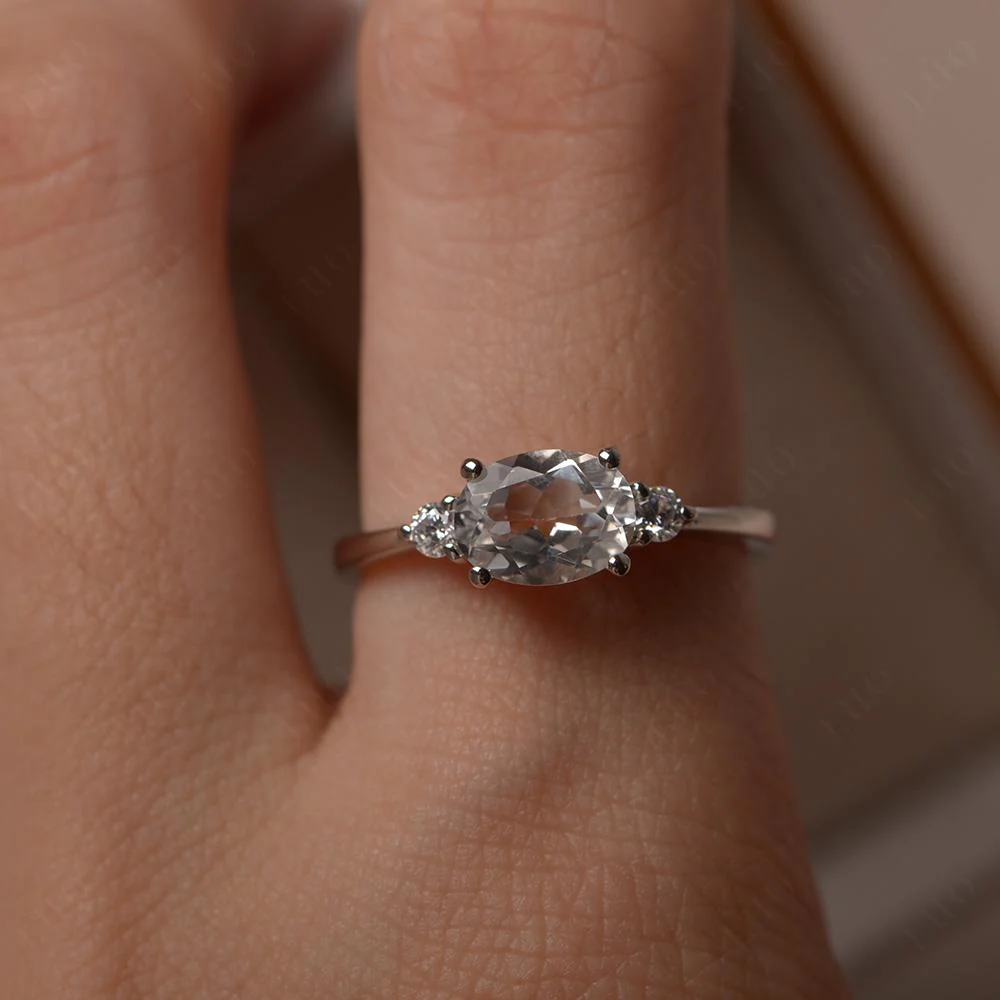 Oval East West White Topaz Trilogy Ring - Image 14