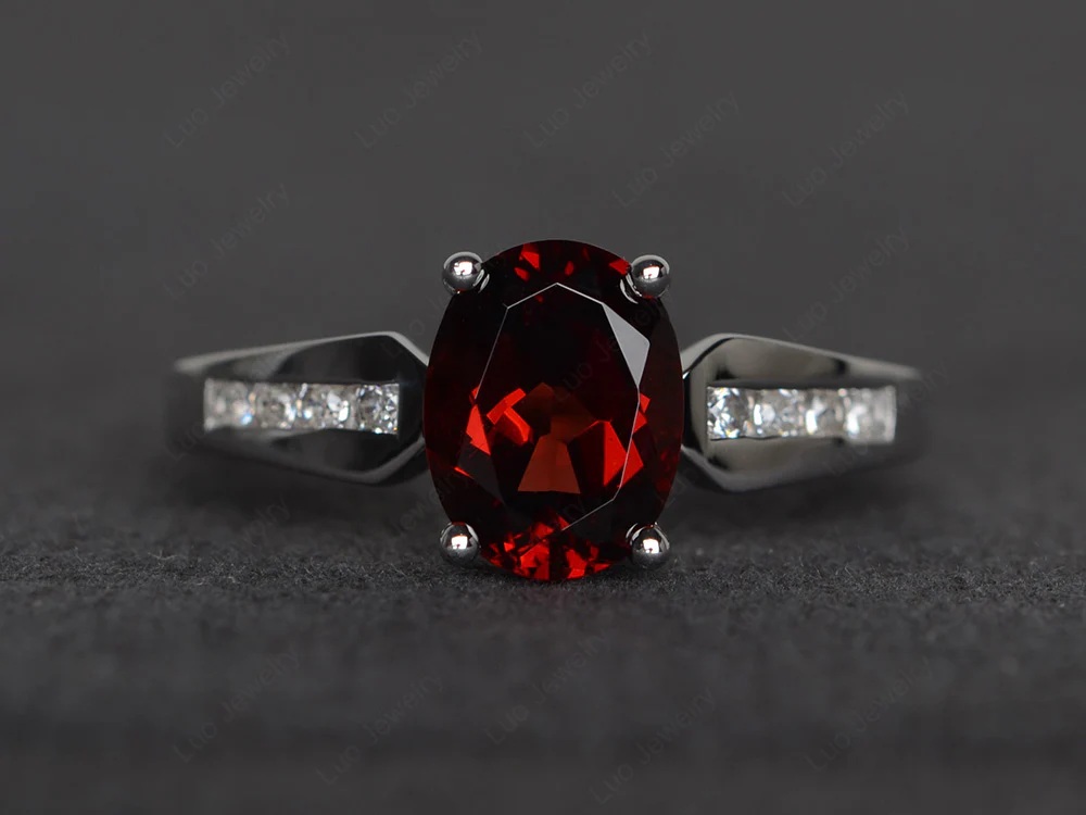 Oval Garnet Ring with Channel Band