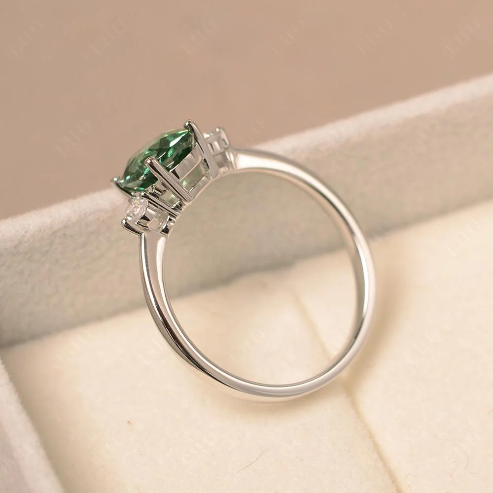 Trilogy Oval Green Sapphire Ring - Image 31