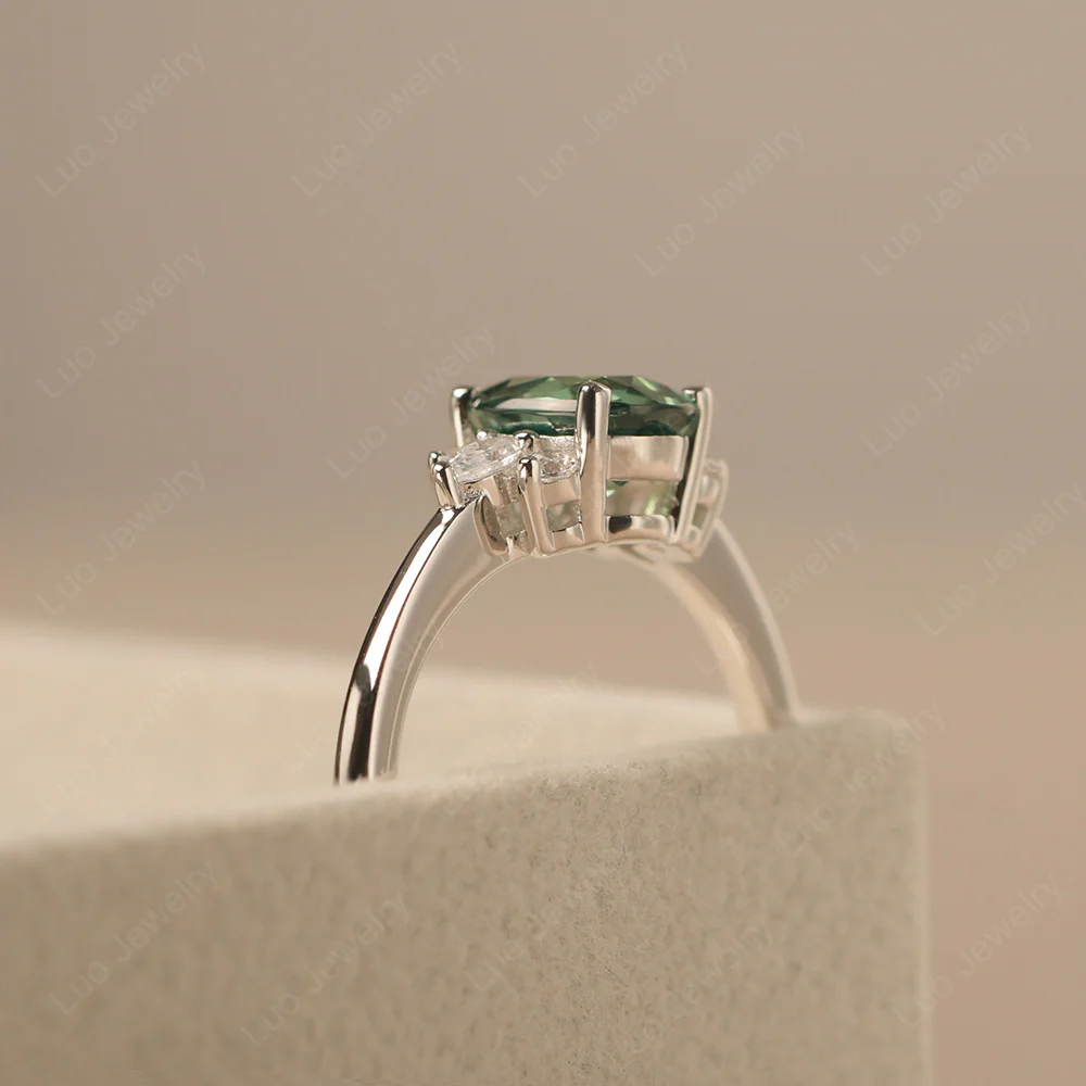 Oval Green Sapphire Ring with Pear Side Stone - Image 4