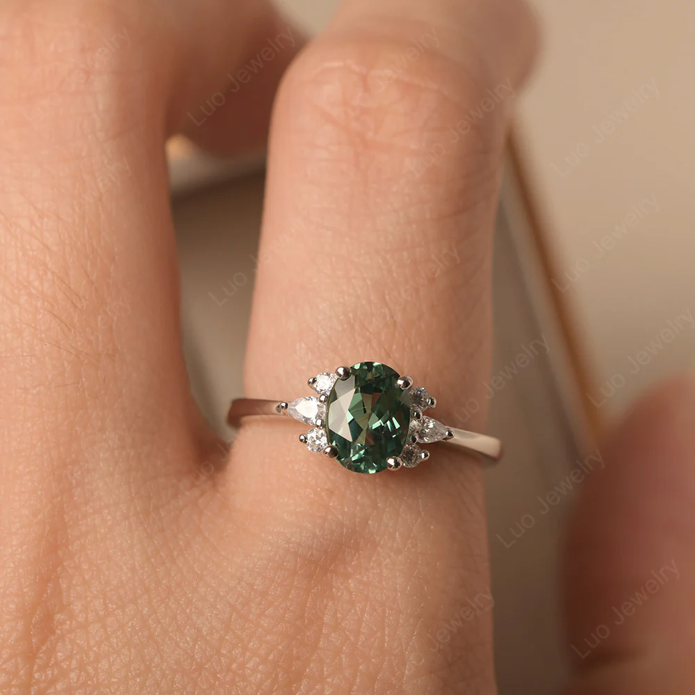 Oval Green Sapphire Ring with Pear Side Stone - Image 5