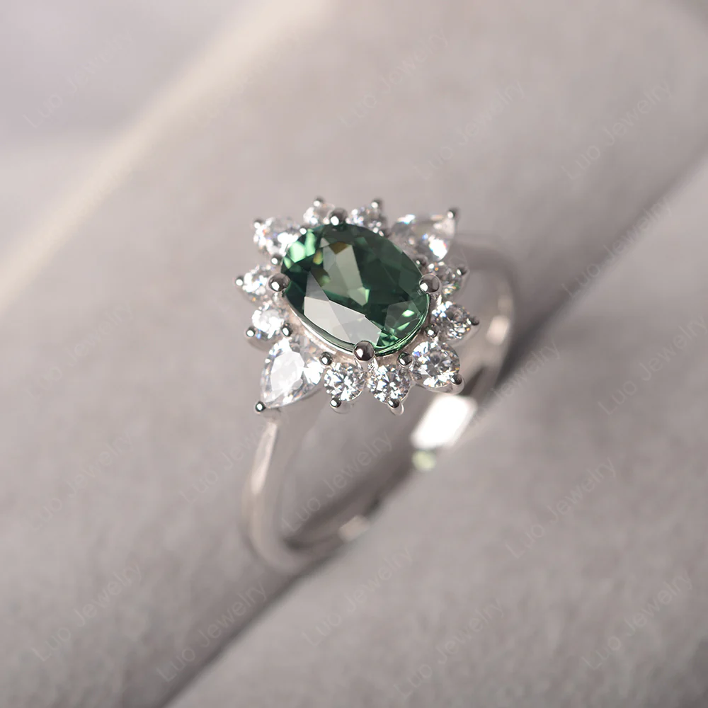 Oval Cut Green Sapphire Ring with Pear Side Stone - Image 2