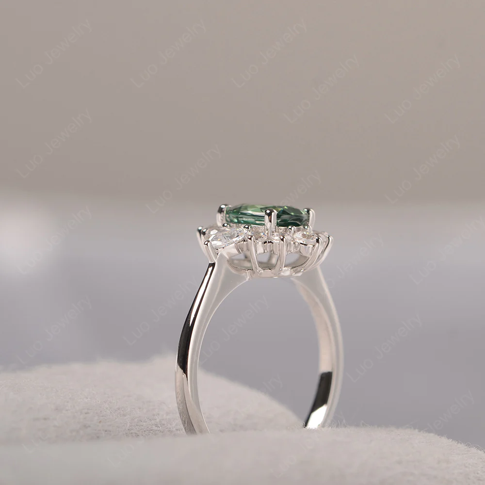 Oval Cut Green Sapphire Ring with Pear Side Stone - Image 4
