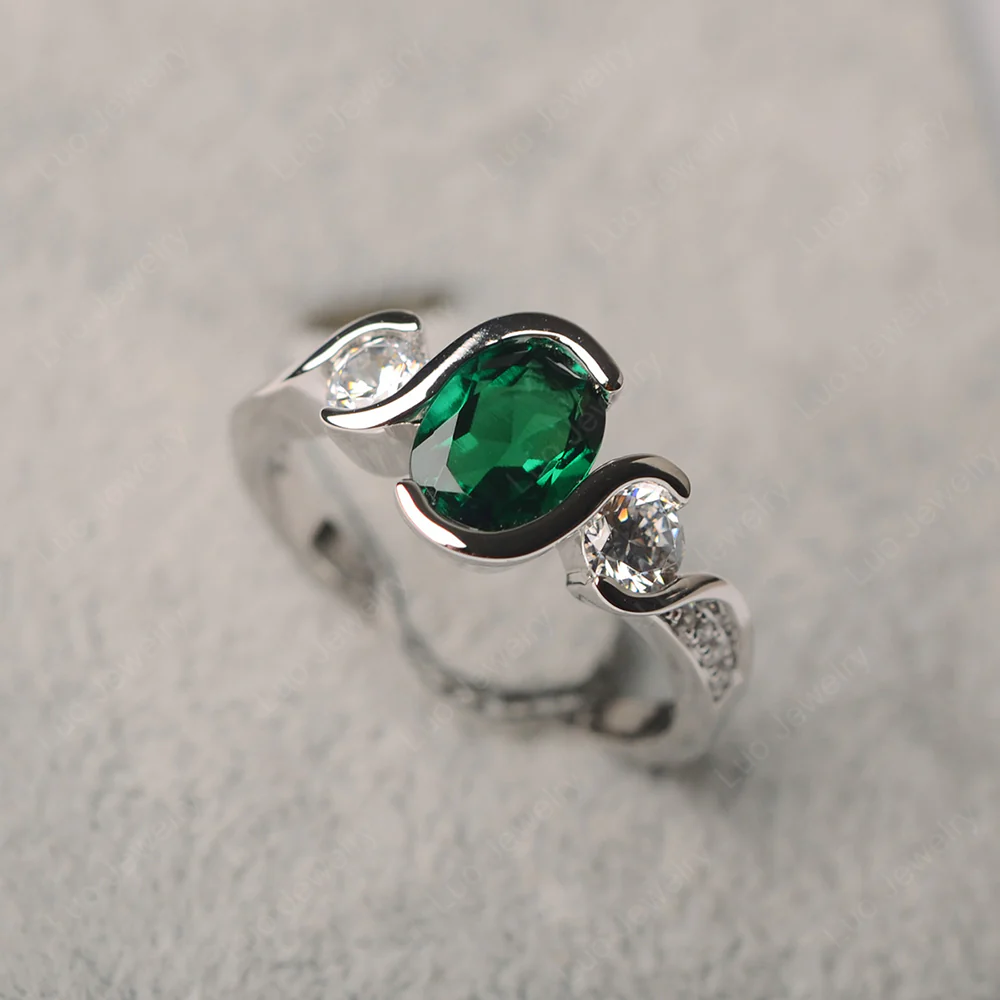 Oval Cut Emerald Swirl Ring - Image 2