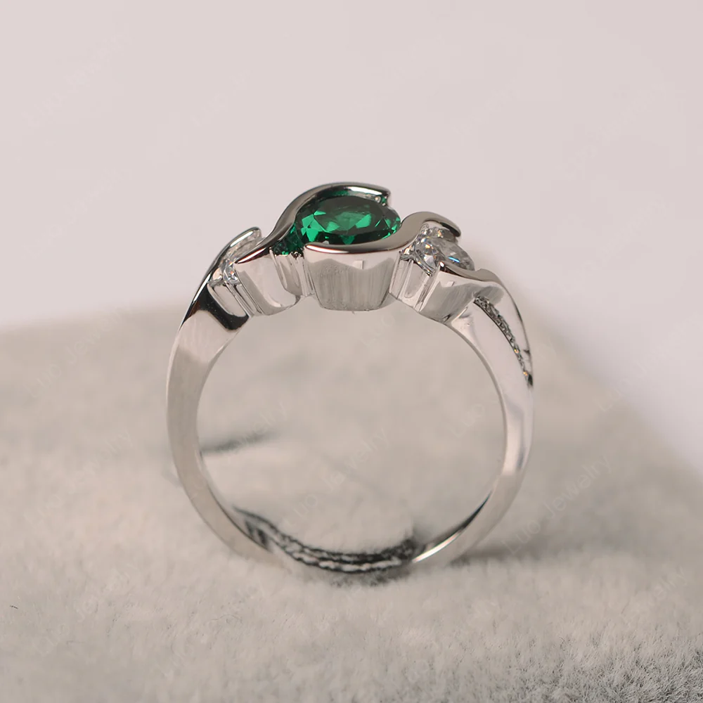 Oval Cut Emerald Swirl Ring - Image 3