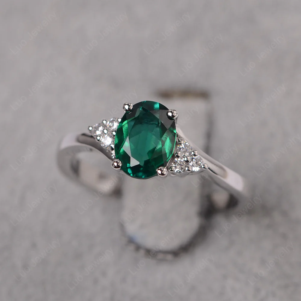 Oval Emerald Bypass Engagement Ring