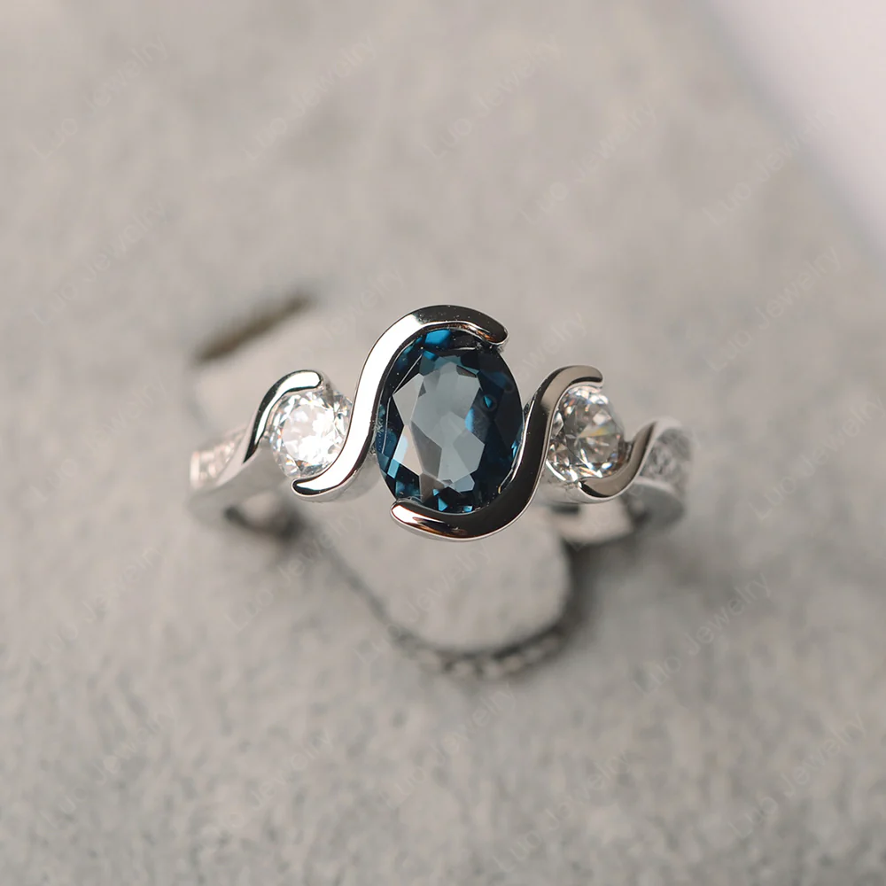 London Blue Topaz Three Stone Bezel Set Ring