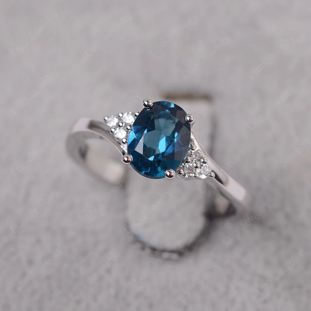 Oval London Blue Topaz Bypass Engagement Ring
