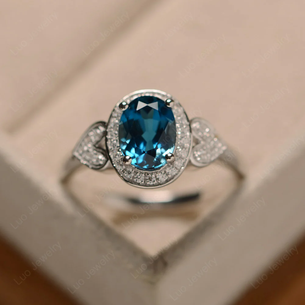 Oval Cut London Blue Topaz Halo Engagement Ring