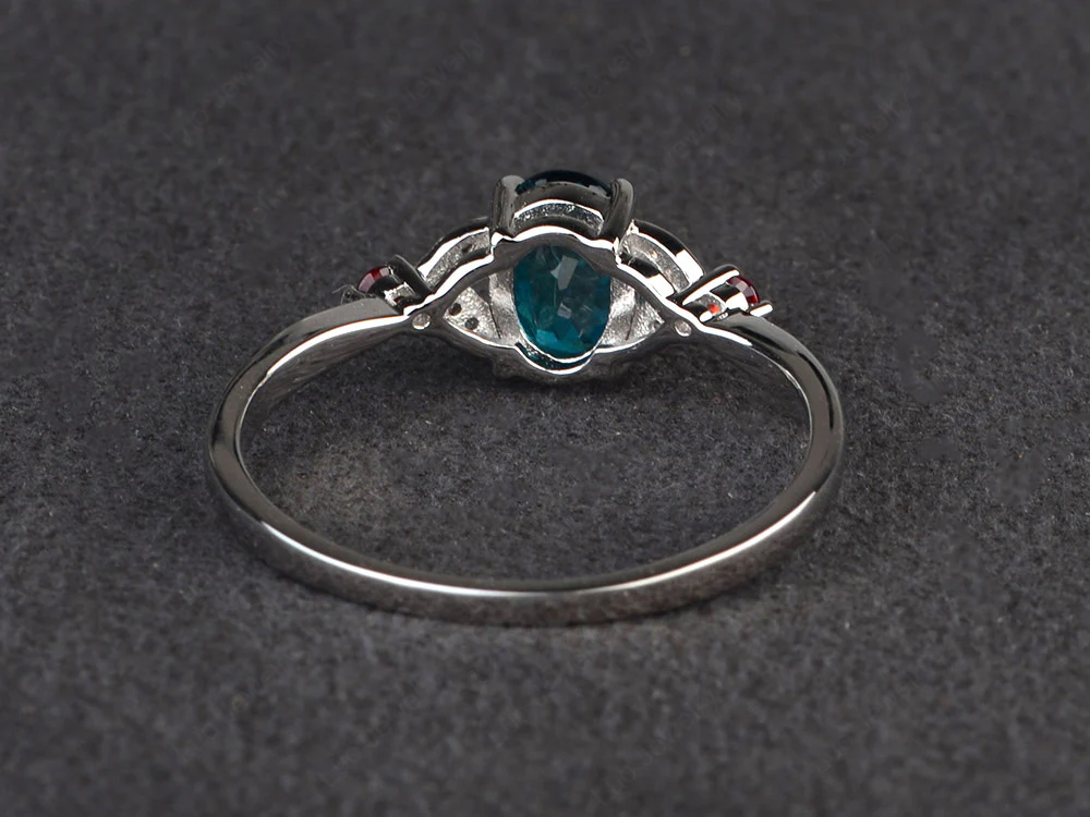 Simple Oval Cut London Blue Topaz and Garnet Promise Ring - Image 3