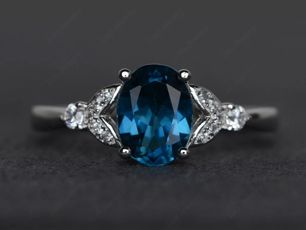 Simple Oval Cut London Blue Topaz Promise Ring