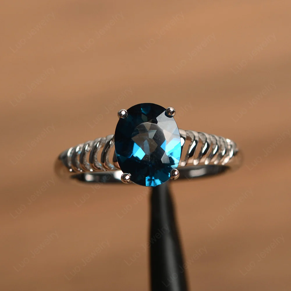 Oval Cut London Blue Topaz Wave Ring