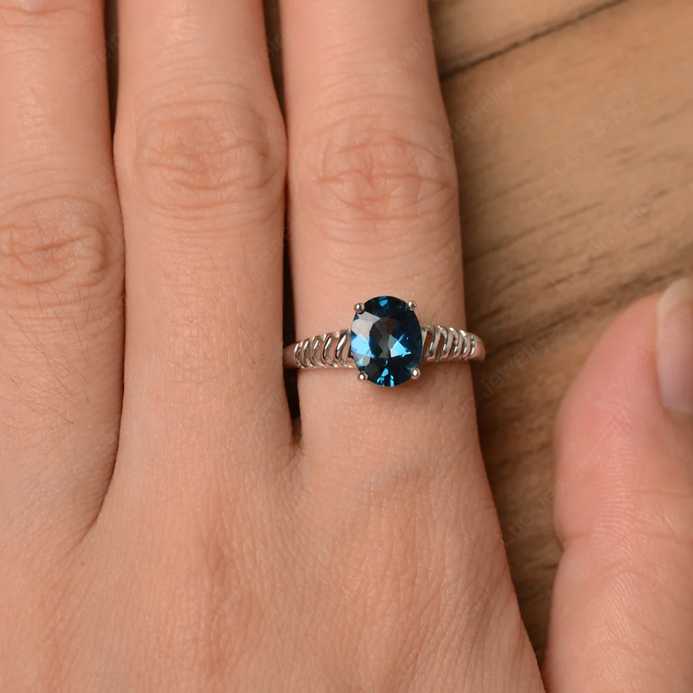Oval Cut London Blue Topaz Wave Ring - Image 4