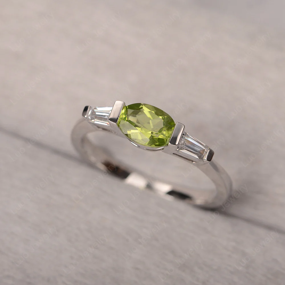 Oval Peridot Ring with Baguettes