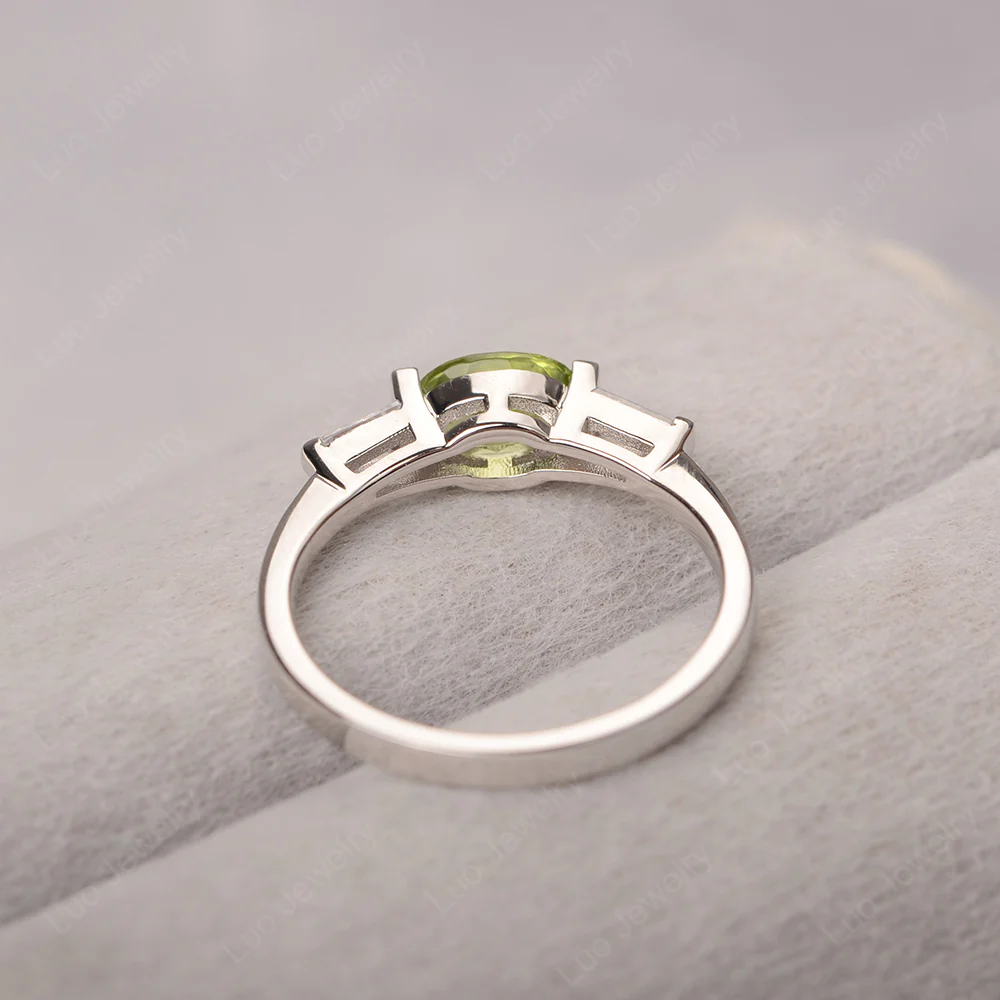 Oval Peridot Ring with Baguettes - Image 3