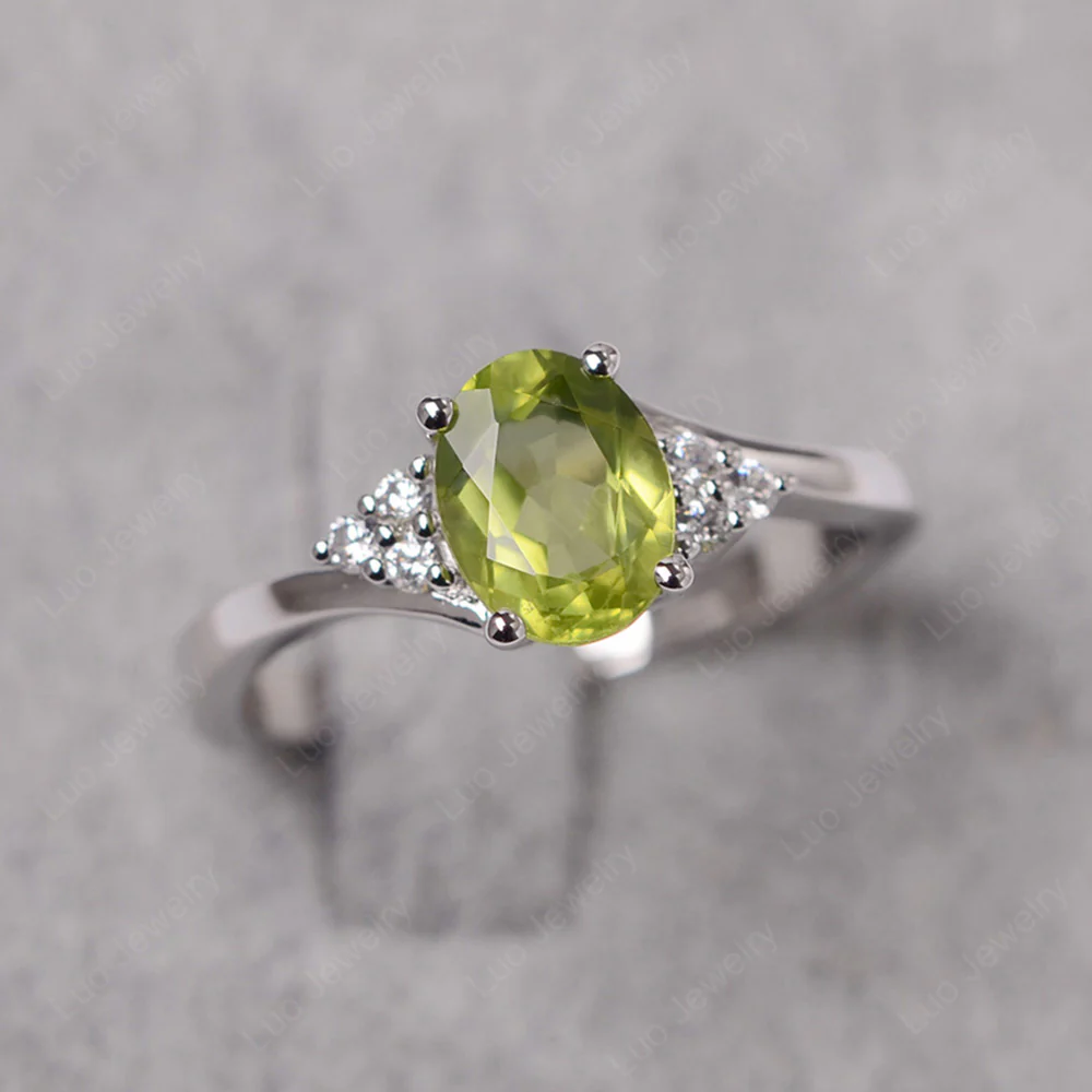 Oval Peridot Bypass Engagement Ring