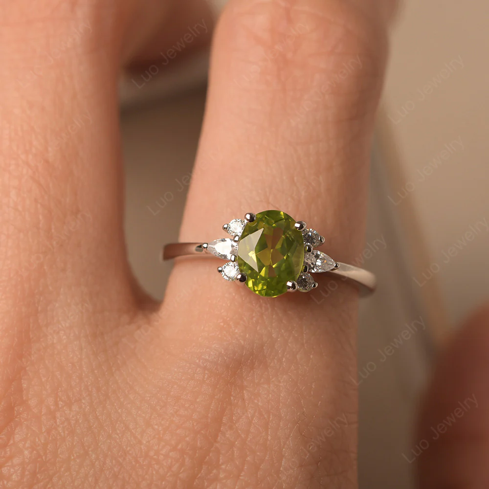Oval Peridot Ring with Pear Side Stone - Image 5