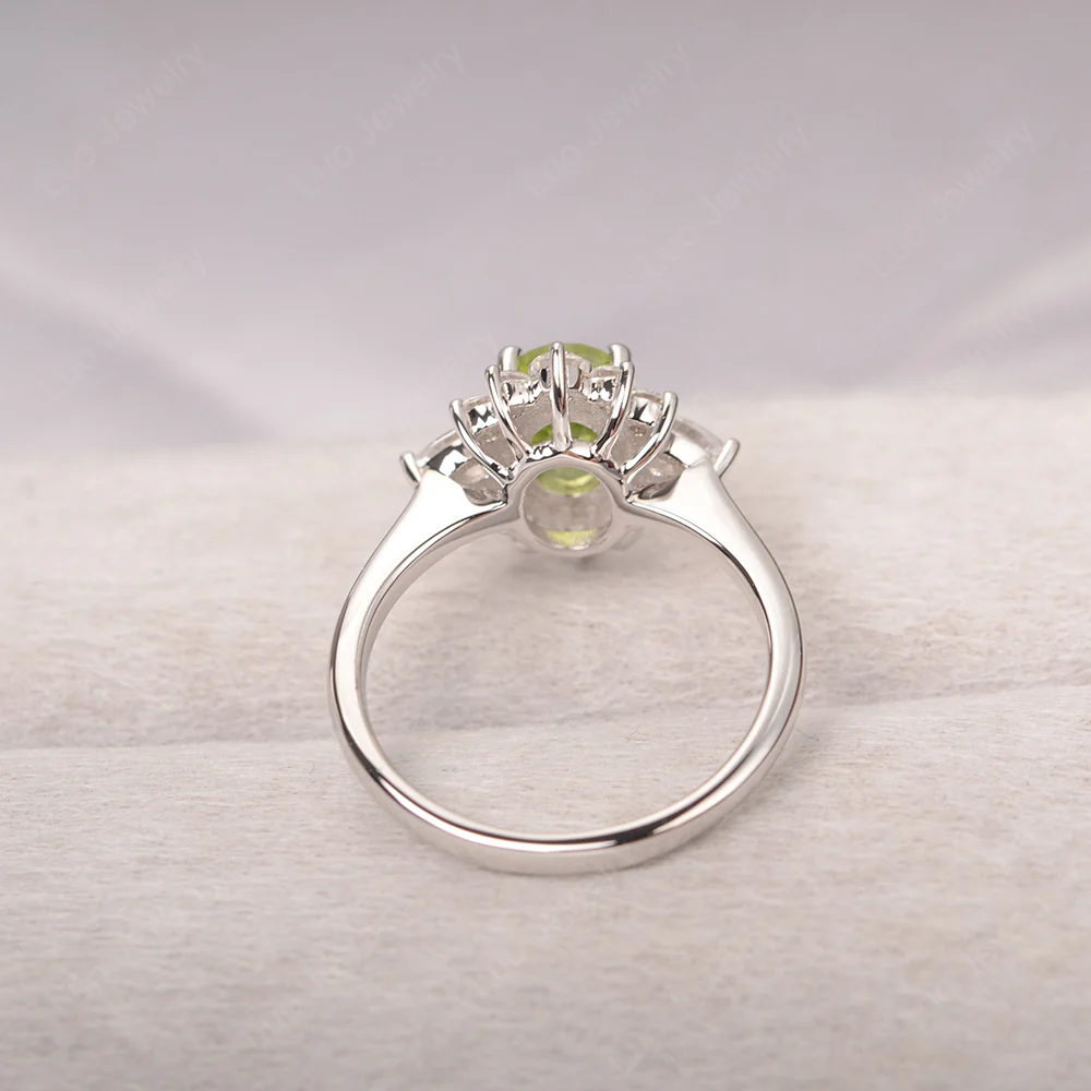 Oval Cut Peridot Ring with Pear Side Stone - Image 3