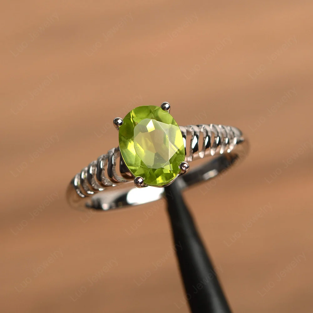Oval Cut Peridot Wave Ring