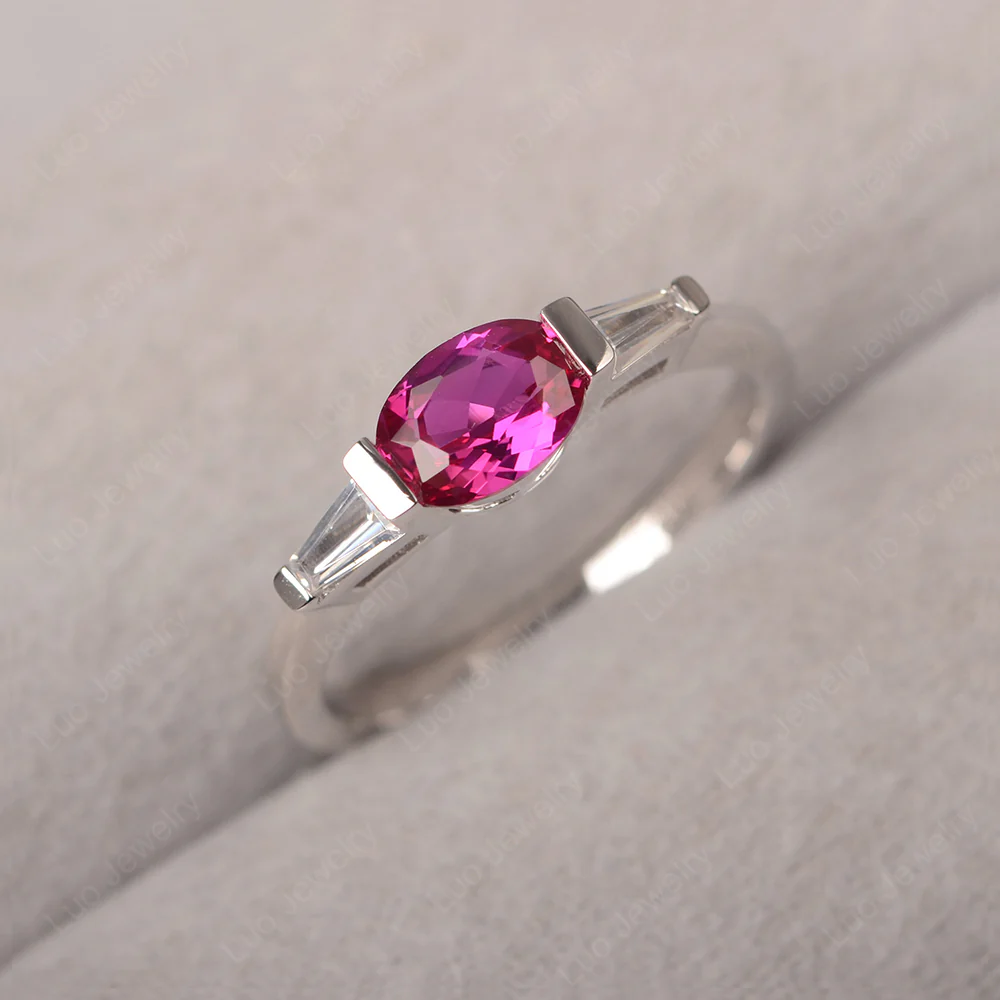 Oval Ruby Ring with Baguettes