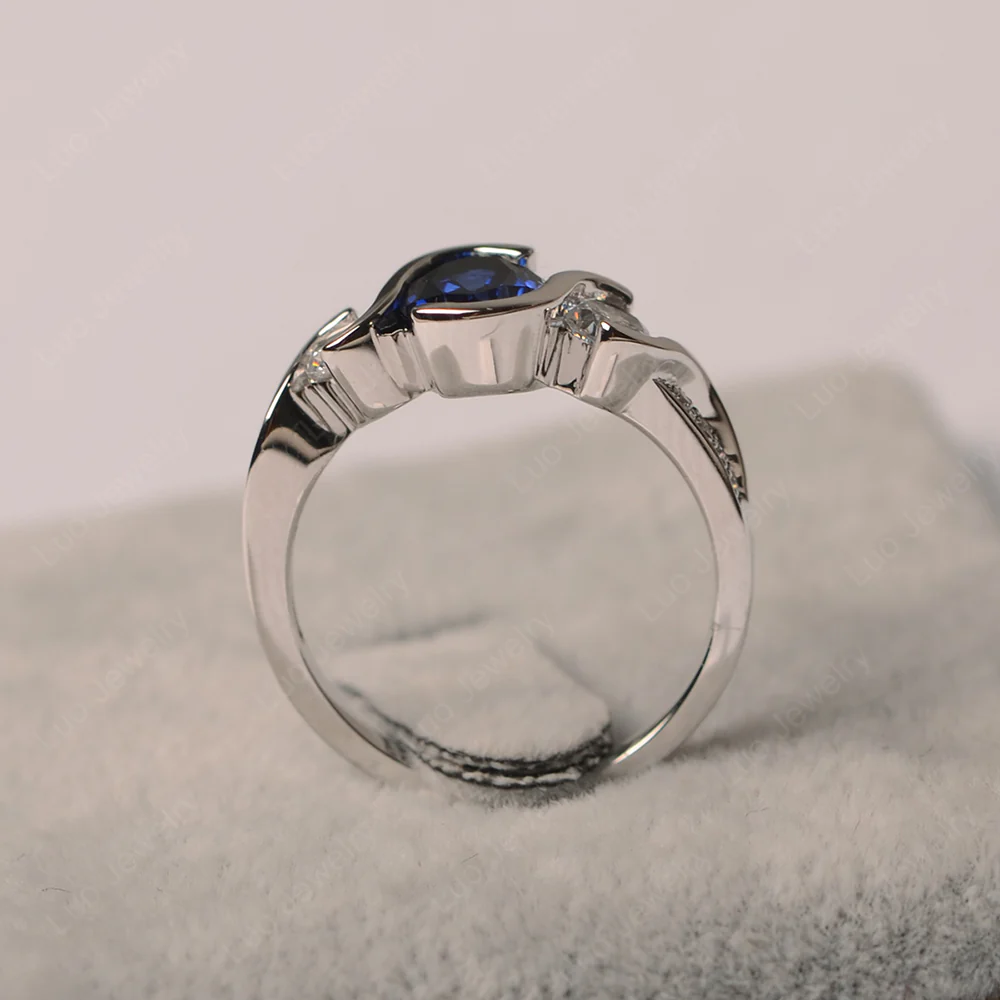 Oval Cut Sapphire Swirl Ring - Image 3