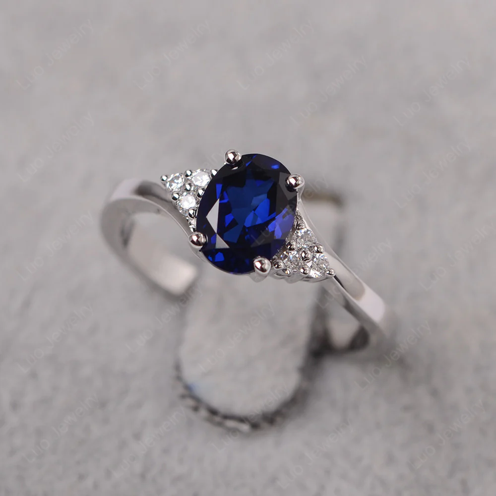 Oval Sapphire Bypass Engagement Ring