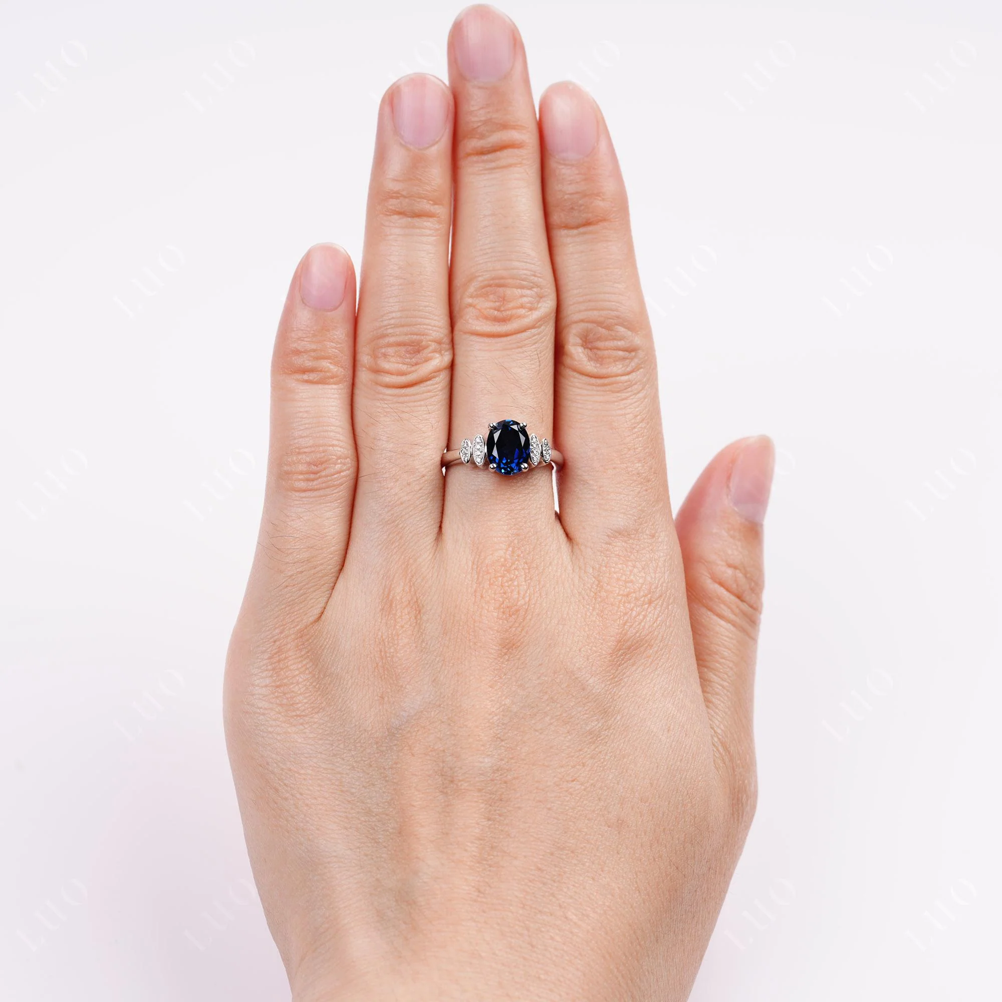 Oval Cut Simple Sapphire Engagement Ring - Image 5