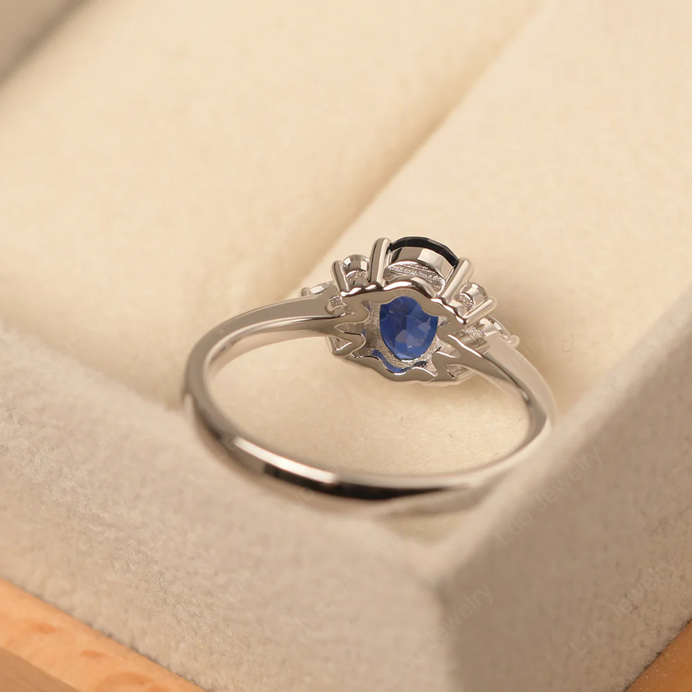 Oval Sapphire Ring with Pear Side Stone - Image 3