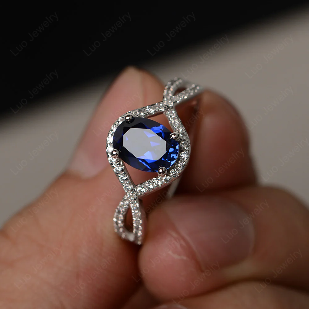 Oval Sapphire Twisted Engagement Ring - Image 2