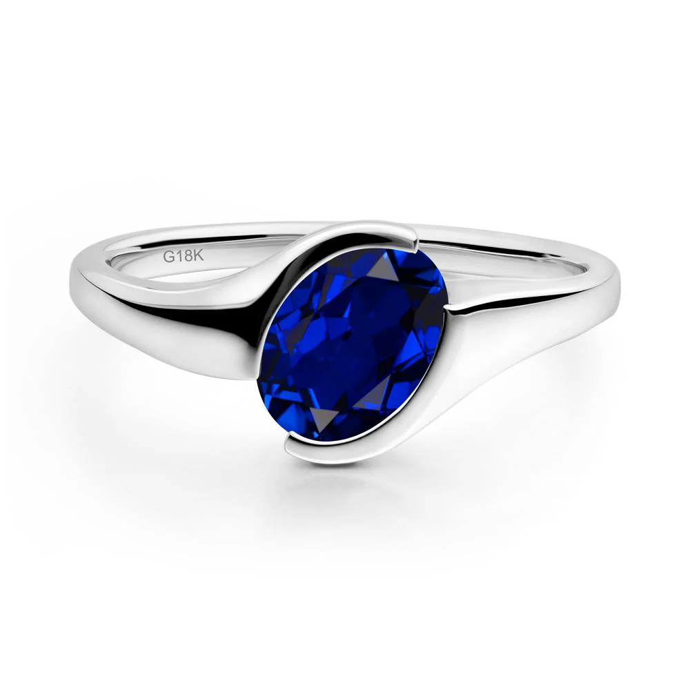Oval Cut Sapphire Solitaire Bypass Ring - Image 4