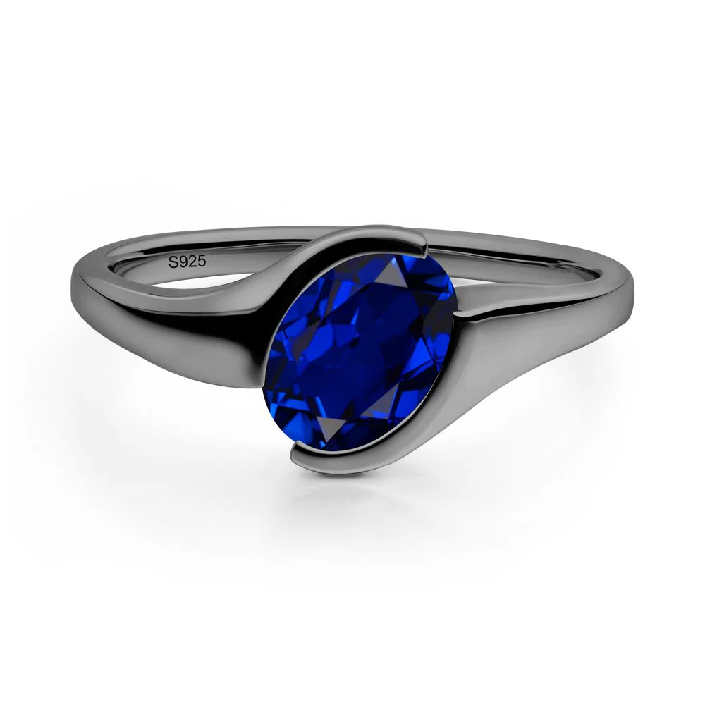 Oval Cut Sapphire Solitaire Bypass Ring - Image 8