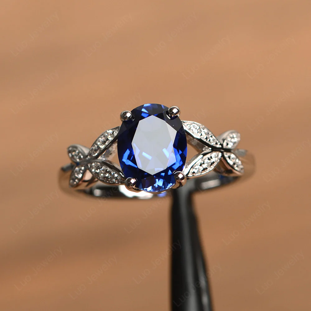 Oval Cut Sapphire Butterfly Inspired Ring