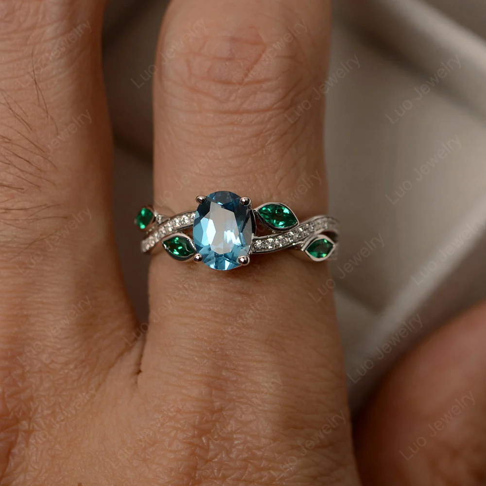 Oval Cut Swiss Blue Topaz Leaf Ring - Image 4