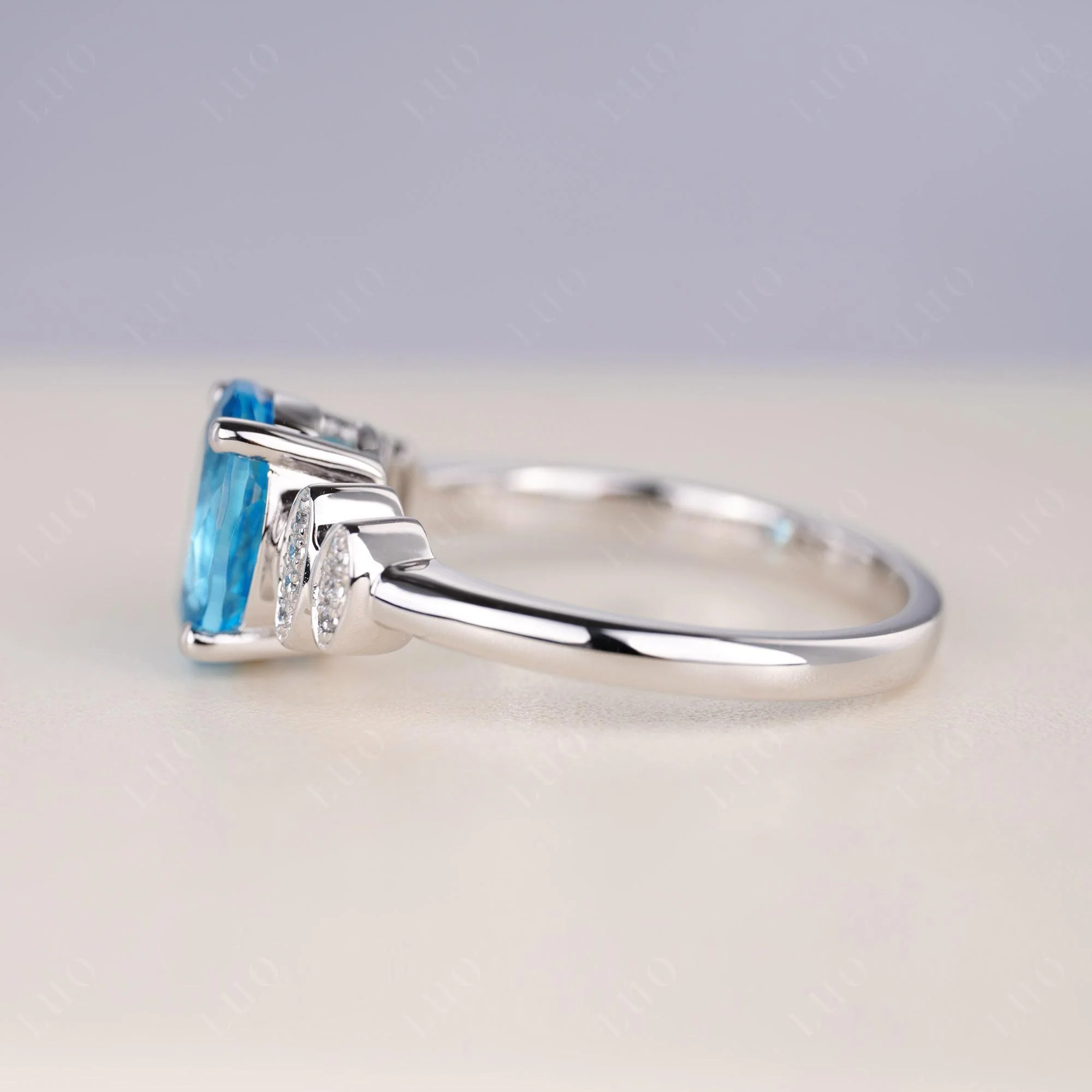 Oval Cut Simple Swiss Blue Topaz Engagement Ring - Image 4