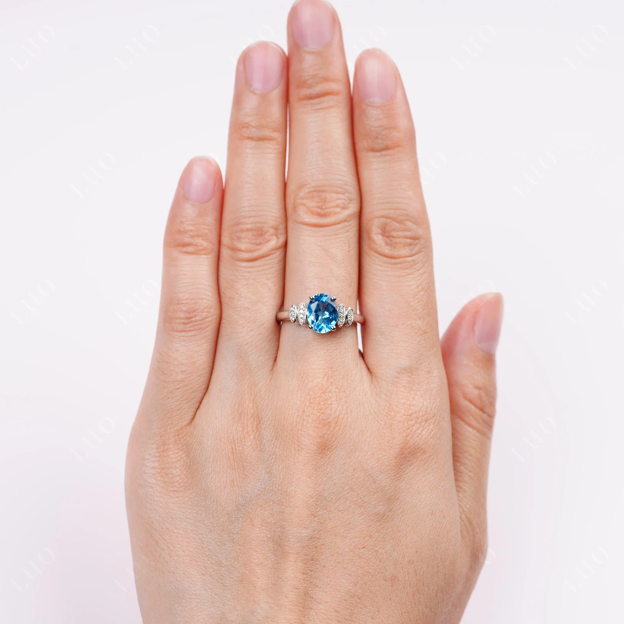 Oval Cut Simple Swiss Blue Topaz Engagement Ring - Image 5