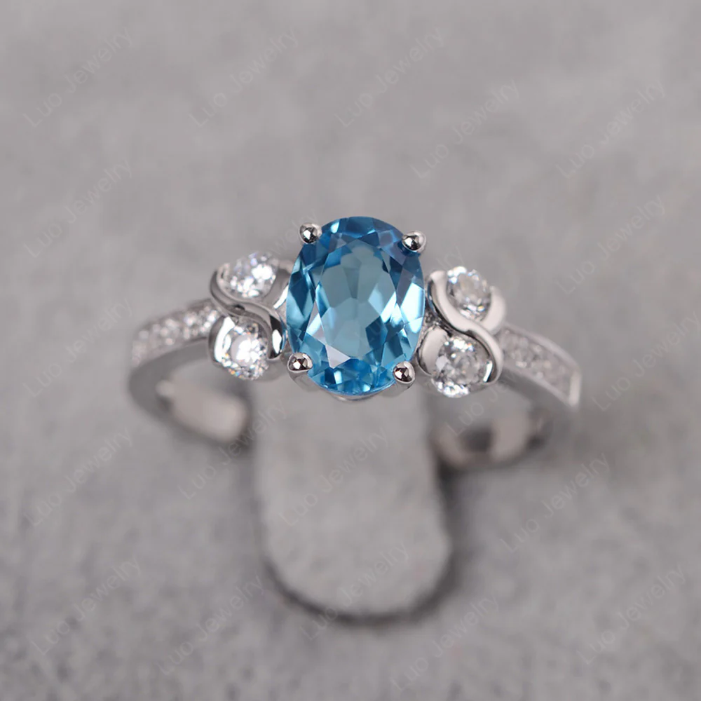 Swiss Blue Topaz Infinity Oval Engagement Ring