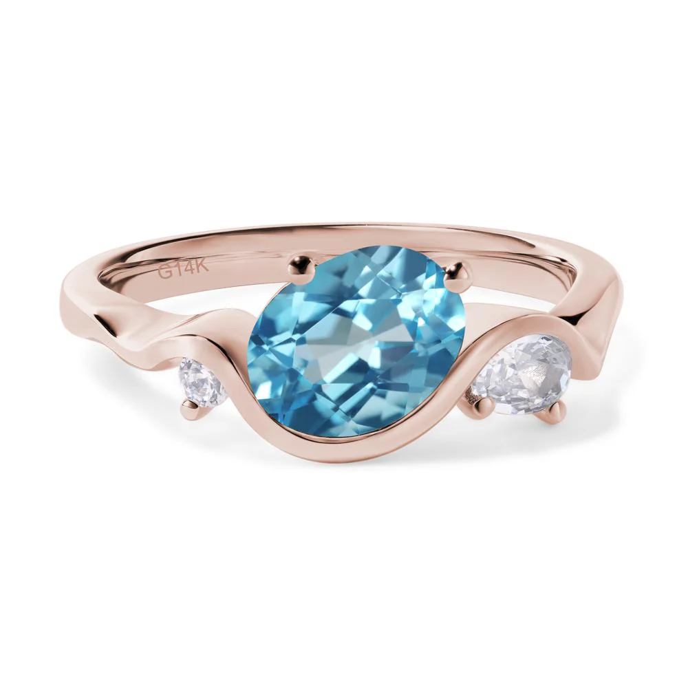 Wave Oval Swiss Blue Topaz Engagement Ring