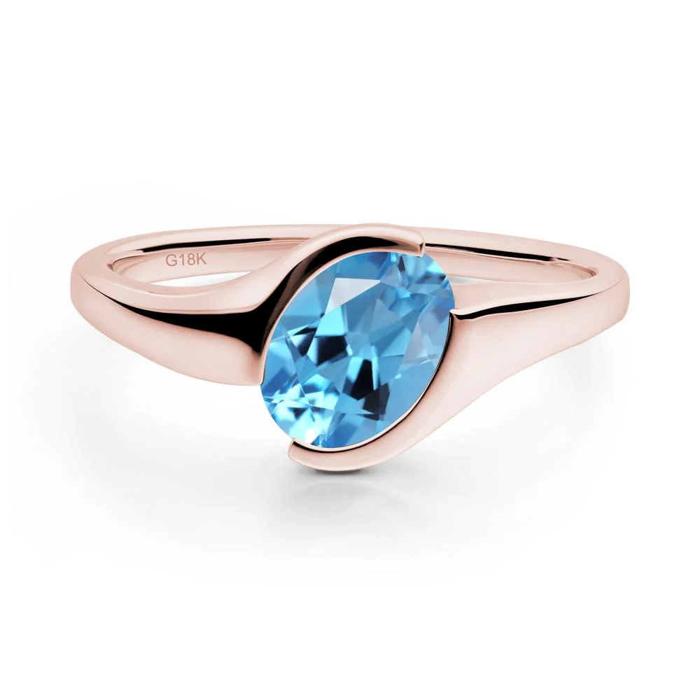Oval Cut Swiss Blue Topaz Solitaire Bypass Ring - Image 2