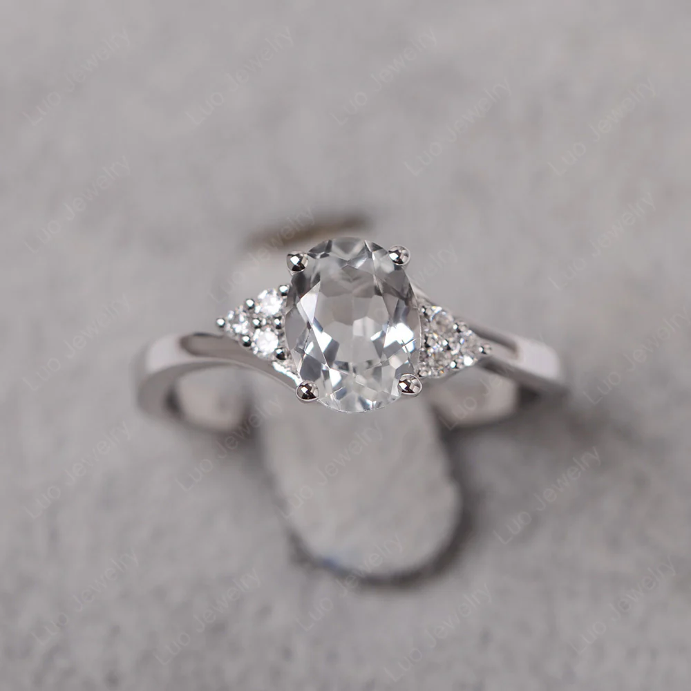 Oval White Topaz Bypass Engagement Ring