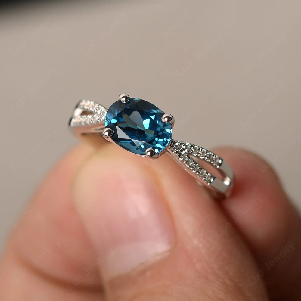Oval East West London Blue Topaz Engagement Ring