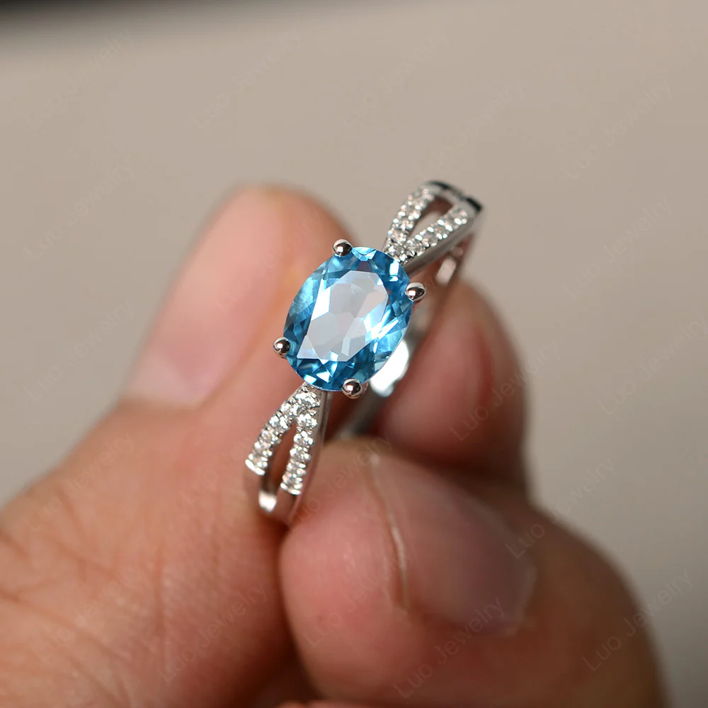 Oval East West Swiss Blue Topaz Engagement Ring