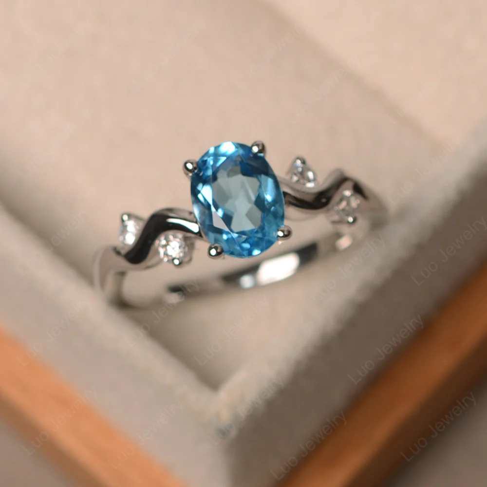 Swiss Blue Topaz Twisty Engagement Ring