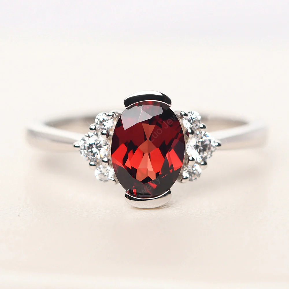 Oval Half Bezel Set Garnet Engagement Ring