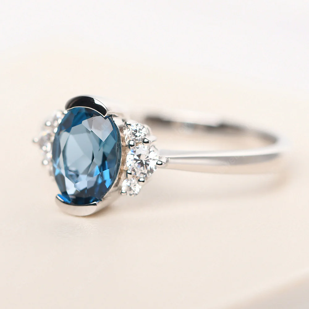 Oval Half Bezel Set London Blue Topaz Engagement Ring - Image 2