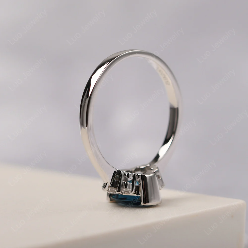 Oval Half Bezel Set London Blue Topaz Engagement Ring - Image 4