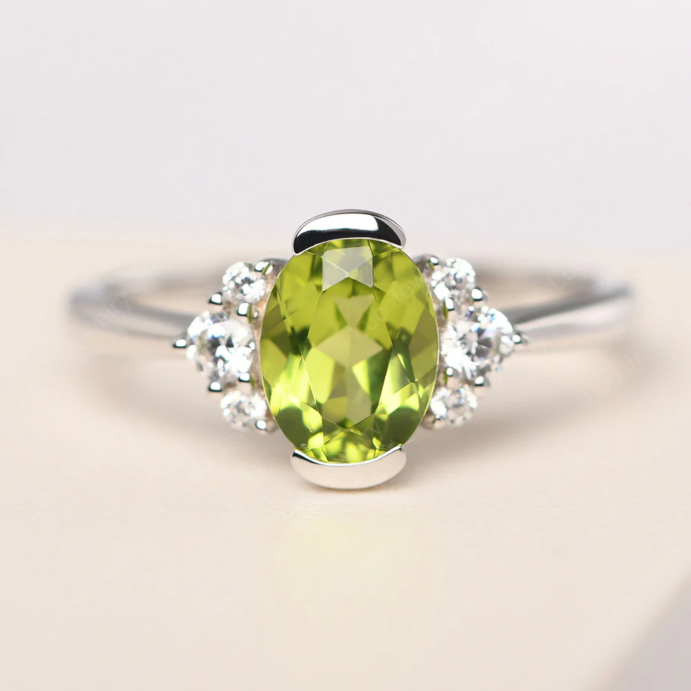 Oval Half Bezel Set Peridot Engagement Ring