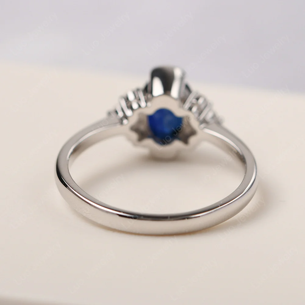 Oval Half Bezel Set Sapphire Engagement Ring - Image 3