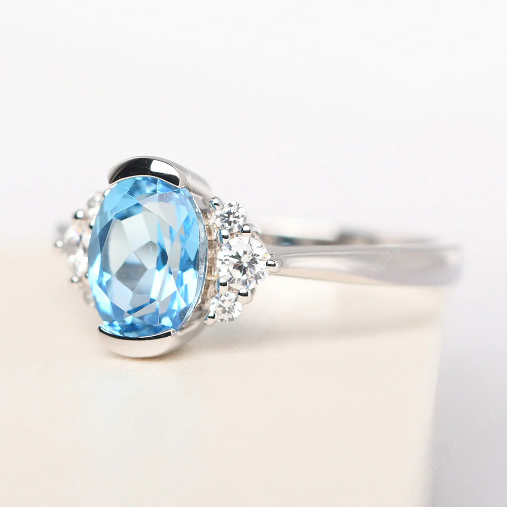 Oval Half Bezel Set Swiss Blue Topaz Engagement Ring - Image 2