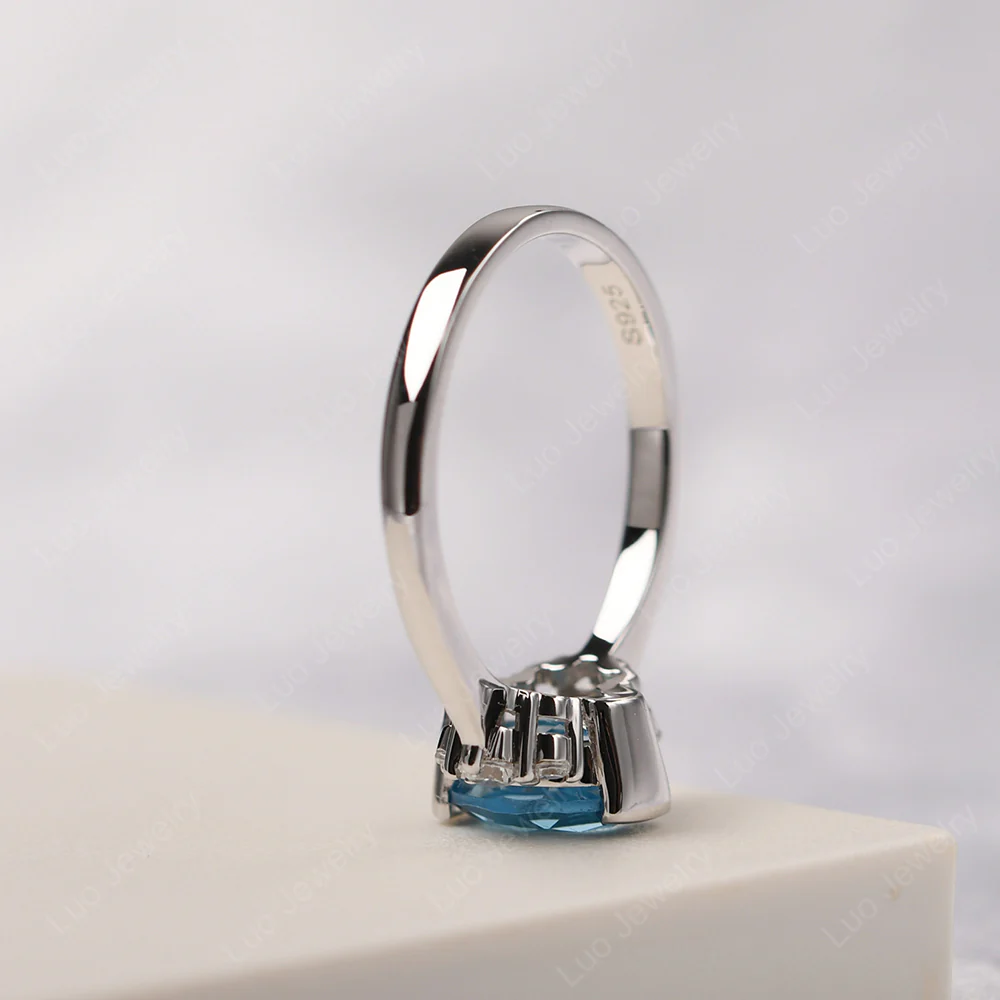 Oval Half Bezel Set Swiss Blue Topaz Engagement Ring - Image 4